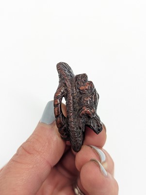 Lot 1021 - A JAPANESE WOOD NETSUKE OF A TOAD ON A SLIPPER