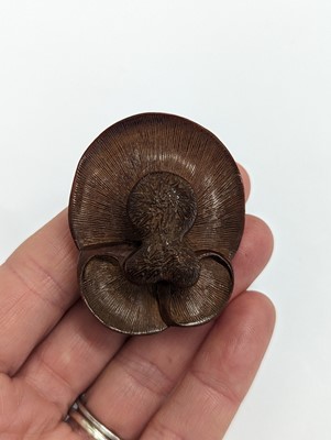 Lot 1024 - A JAPANESE WOOD MUSHROOM GROUP NETSUKE
