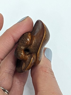 Lot 1024 - A JAPANESE WOOD MUSHROOM GROUP NETSUKE