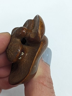 Lot 1024 - A JAPANESE WOOD MUSHROOM GROUP NETSUKE