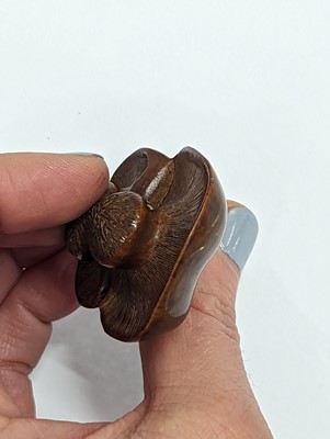 Lot 1024 - A JAPANESE WOOD MUSHROOM GROUP NETSUKE