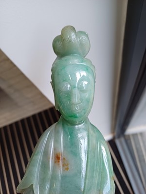 Lot 185 - A CHINESE JADE CARVING OF GUANYIN