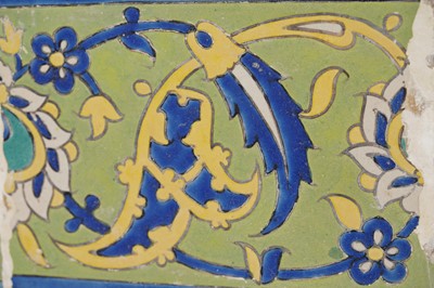 Lot 290 - TWO DECORATIVE WALL PANELS OF SAFAVID CUERDA SECA POTTERY TILES