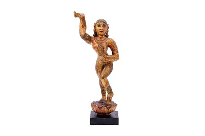 Lot 105 - A CARVED WOODEN GILT AND POLYCHROME-PAINTED YAKSHINI STATUE