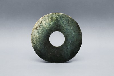 Lot 361 - A CHINESE ARCHAIC GREEN JADE DISC, BI