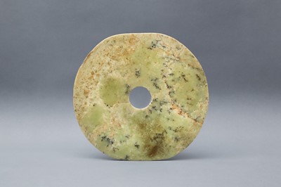 Lot 198 - A LARGE CHINESE ARCHAIC GREEN JADE DISC, BI