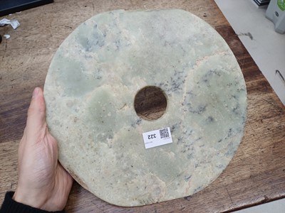 Lot 322 - A LARGE CHINESE ARCHAIC GREEN JADE DISC, BI