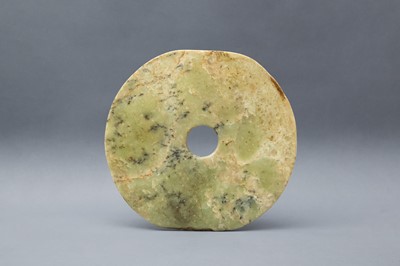 Lot 322 - A LARGE CHINESE ARCHAIC GREEN JADE DISC, BI