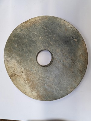 Lot 374 - A LARGE CHINESE ARCHAIC MOTTLED GREEN JADE DISC, BI