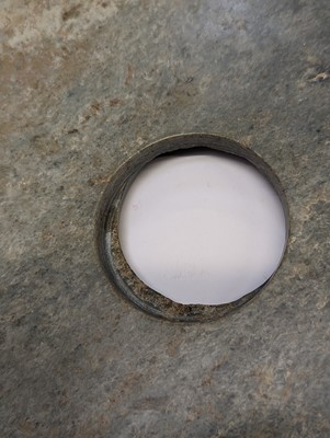 Lot 374 - A LARGE CHINESE ARCHAIC MOTTLED GREEN JADE DISC, BI