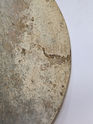 Lot 374 - A LARGE CHINESE ARCHAIC MOTTLED GREEN JADE DISC, BI