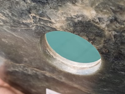 Lot 373 - A LARGE CHINESE ARCHAIC MOTTLED GREEN JADE DISC, BI