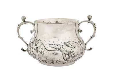 Lot 497 - A large Charles II sterling silver twin handled porringer, London 1662 possibly by John Burges (free. 1624, d. 1662)