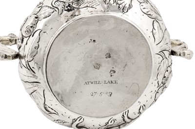 Lot 497 - A large Charles II sterling silver twin handled porringer, London 1662 possibly by John Burges (free. 1624, d. 1662)