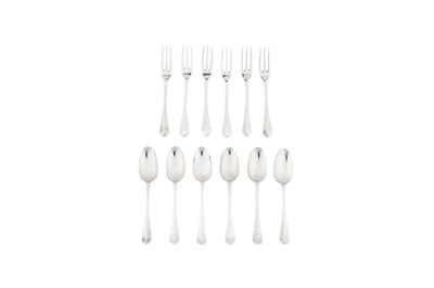 Lot 298 - A set of George I sterling silver dessert spoons and forks, London 1723 by William Petley