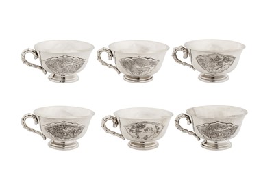 Lot 165 - A set of six mid-20th century Vietnamese silver tea cups and saucers, Hanoi circa 1960