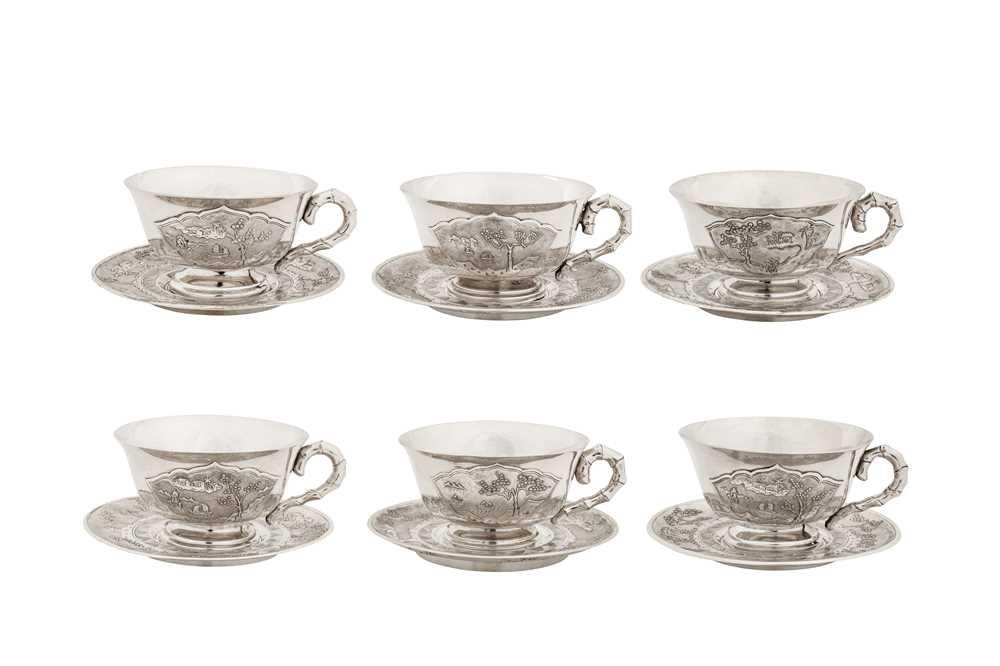 Lot 165 - A set of six mid-20th century Vietnamese silver tea cups and saucers, Hanoi circa 1960