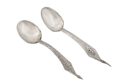 Lot 238 - Two mid-20th century Thai silver serving spoons