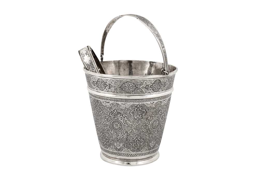 Lot 176 - A mid-20th century Persian (Iranian) silver ice bucket, Isfahan circa 1950 mark of Bagher Parvaresh (c.1910-1978, master 1928)