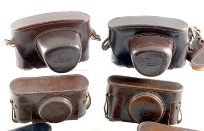 Lot 246 - Group of Seven Leica Camera Cases with Straps.