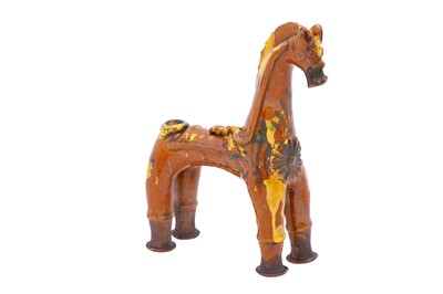 Lot 412 - A RARE YELLOW AND SILVER-SPLASHED HORSE-SHAPED CHANAKKALE POTTERY AQUAMANILE