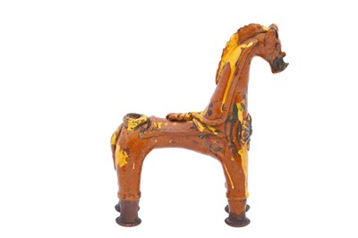 Lot 412 - A RARE YELLOW AND SILVER-SPLASHED HORSE-SHAPED CHANAKKALE POTTERY AQUAMANILE