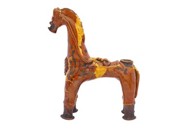 Lot 412 - A RARE YELLOW AND SILVER-SPLASHED HORSE-SHAPED CHANAKKALE POTTERY AQUAMANILE