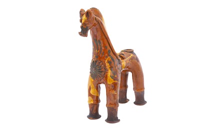 Lot 412 - A RARE YELLOW AND SILVER-SPLASHED HORSE-SHAPED CHANAKKALE POTTERY AQUAMANILE