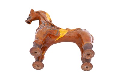 Lot 412 - A RARE YELLOW AND SILVER-SPLASHED HORSE-SHAPED CHANAKKALE POTTERY AQUAMANILE