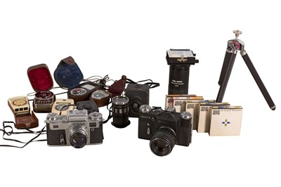 Lot 1412 - A Boxed Zenit-E Outfit With 58mm F2, A Boxed Kiev 4 Outfit With 50mm F2. Inc accessories.