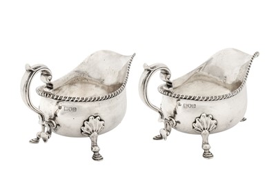 Lot 347 - A pair of Victorian sterling silver sauce boats, London 1901 by Thomas Bradbury