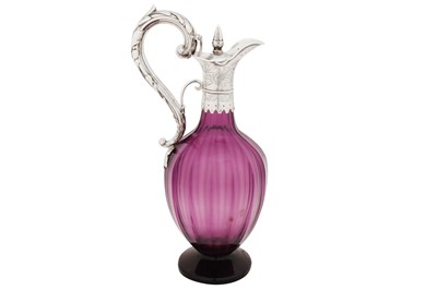 Lot 365 - An early Victorian sterling silver mounted amethyst glass ewer or claret jug, London 1839 by Charles Reily and George Storer