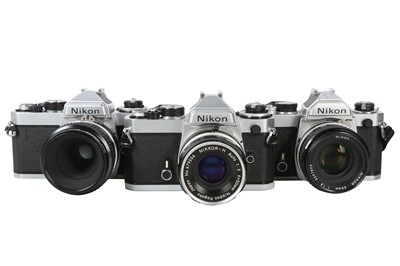 Lot 1047 - Chrome Nikon FE & FM Cameras & Lenses.