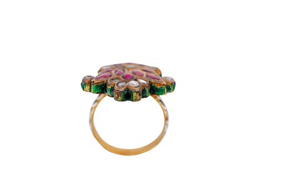 Lot 265 - AN INDIAN POLYCHROME ENAMELLED GEM-SET CHILD'S RING