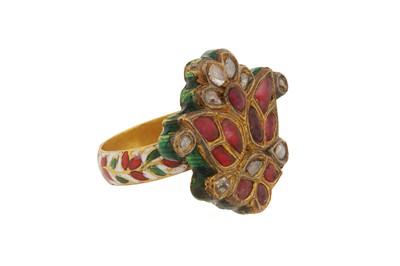 Lot 265 - AN INDIAN POLYCHROME ENAMELLED GEM-SET CHILD'S RING