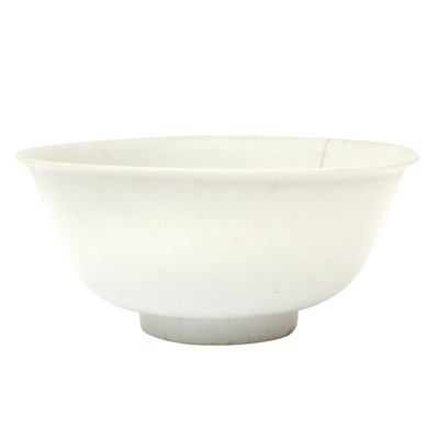 Lot 673 - A Chinese monochrome white-glazed bowl, Ming dynasty