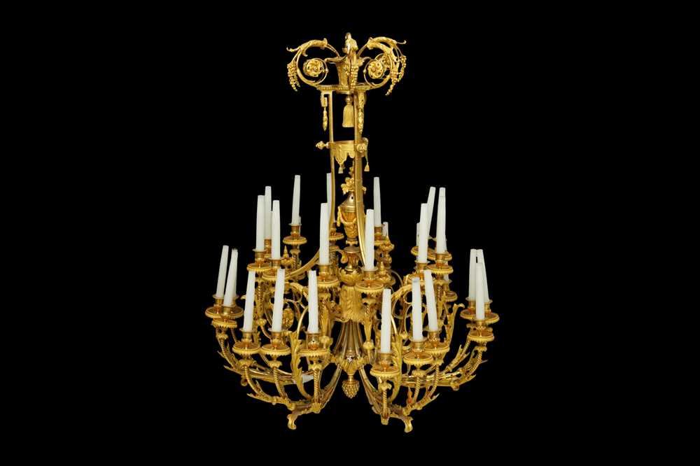 Lot 107 - AN IMPRESSIVE EMPIRE STYLE ORMOLU CHANDELIER