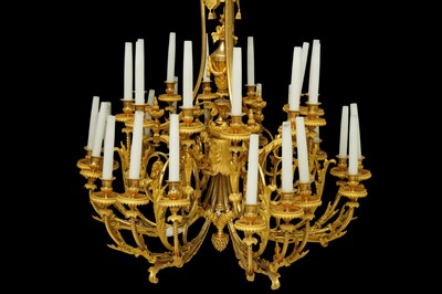 Lot 107 - AN IMPRESSIVE EMPIRE STYLE ORMOLU CHANDELIER