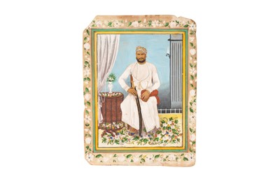 Lot 210 - A TINTED LITHOGRAPHED SEATED PORTRAIT OF AN INDIAN MAHARAJA