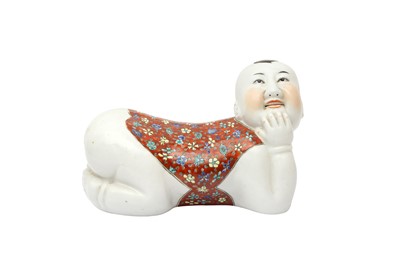 Lot 801 - A CHINESE PORCELAIN 'BOY' PILLOW