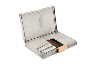 Lot 62 - A mid-20th century French silver, gold, and gem set compact / minaudiere, Paris circa 1940 by Helluin-Mattlinger for Boucheron