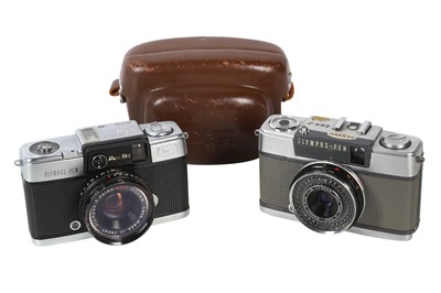 Lot 1022 - A pair of of Olympus Pen cameras.