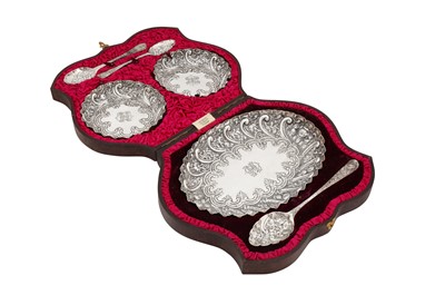 Lot 348 - A cased Victorian sterling silver dessert set, the dishes London 1886 by Charles Evans