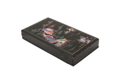 Lot 595 - A CHINESE MOTHER-OF-PEARL-INLAID LACQUER BOX AND COVER
