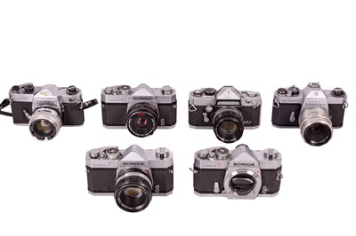 Lot 1043 - Konica & Other SLR Film Cameras.