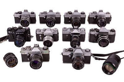 Lot 1130 - Ten Praktica & Zenit Cameras plus Lenses.