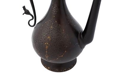 Lot 348 - A QAJAR GOLD-DAMASCENED STEEL EWER