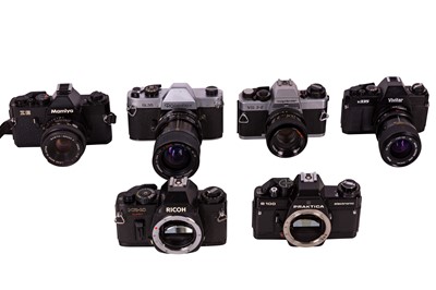 Lot 1052 - A selection of SLR cameras.