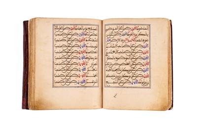 Lot 383 - TWO MAGHRIBI MANUSCRIPTS: MUHAMMAD AL-JAZULI (D.1472)'S DALA’IL AL-KHAYRAT