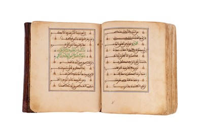 Lot 383 - TWO MAGHRIBI MANUSCRIPTS: MUHAMMAD AL-JAZULI (D.1472)'S DALA’IL AL-KHAYRAT